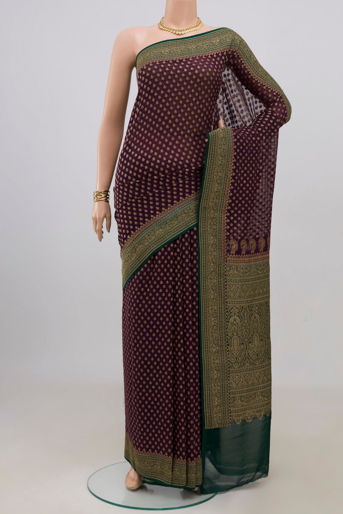 Purple Banarasi Georgette Saree with Zari Butta on the body and Zari Border.  displayed on a mannequin