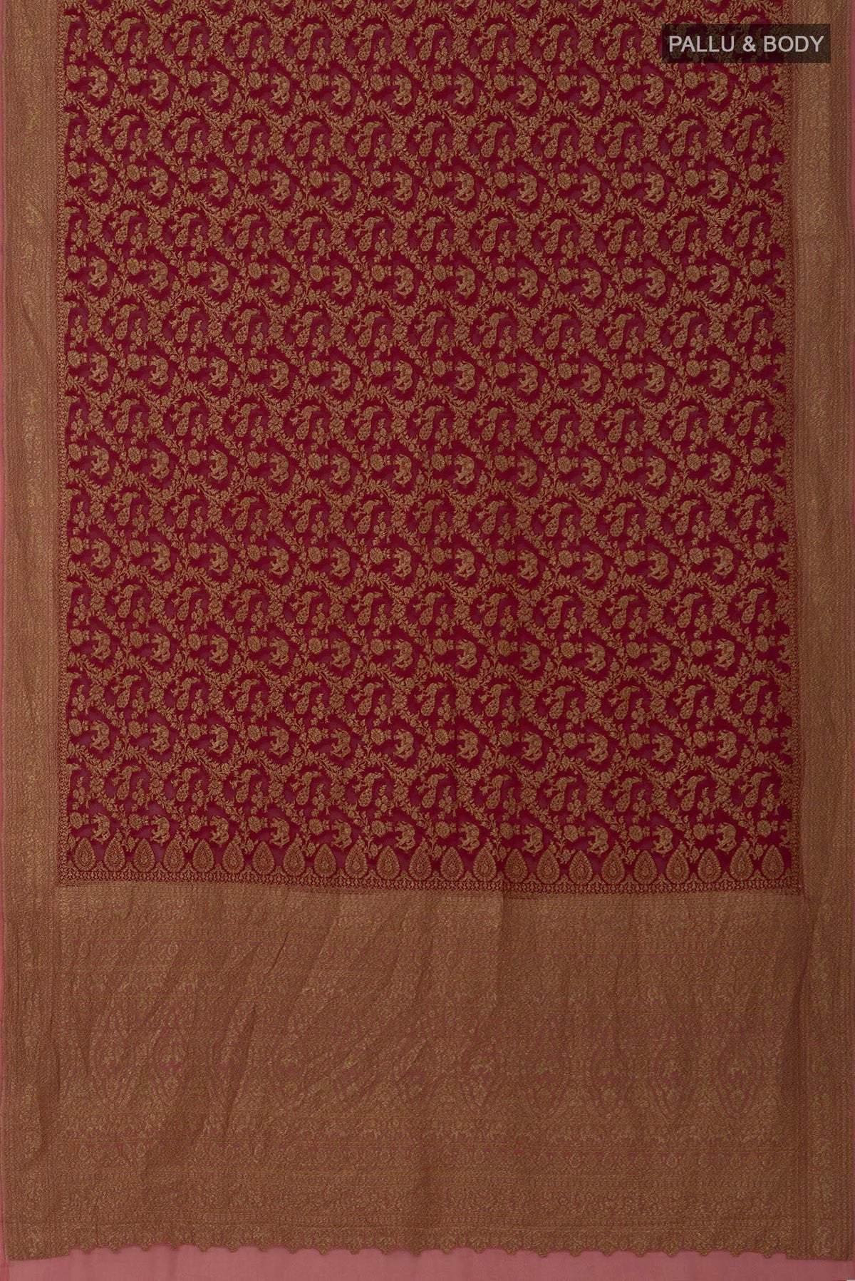 Flat view of Maroon Banarasi Georgette Saree with Zari Brocade on the body and Zig Zag Border. 