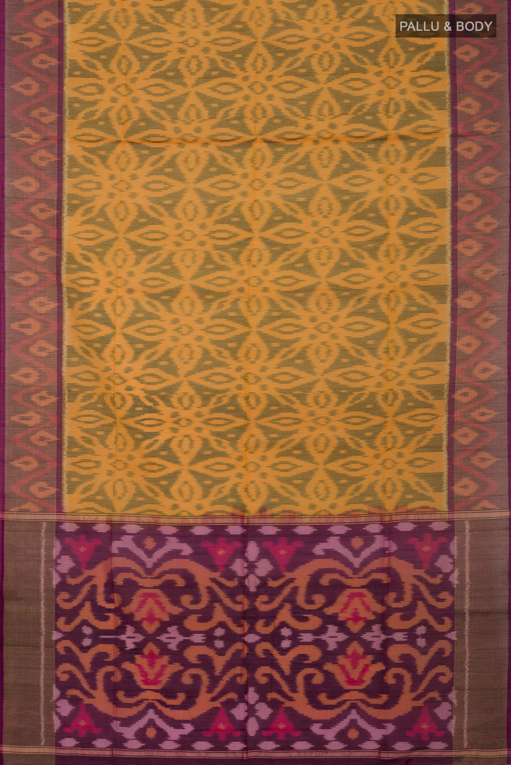 Flat view of Yellow Silk Cotton Saree with Ikat Print on the body and Zari Border. 