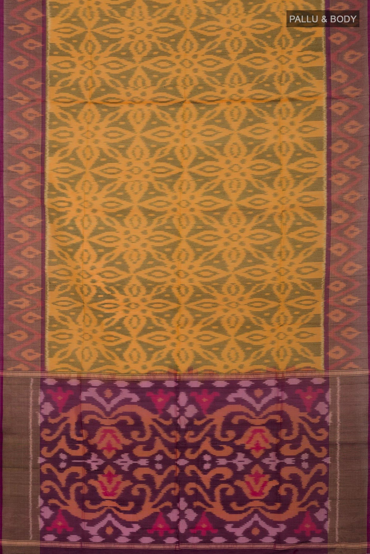 Flat view of Yellow Silk Cotton Saree with Ikat Print on the body and Zari Border. 