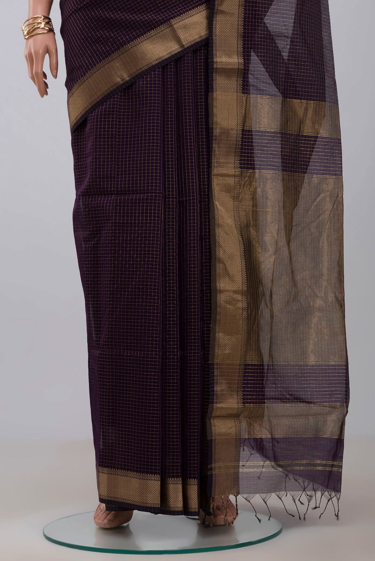 Pleats and pallu of Purple Maheshwari Silk Cotton Saree with Stripes on the body and Zari Border. 