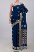 Blue Soft Silk Saree with Zari Butta on the body and Zari Border.  displayed on a mannequin