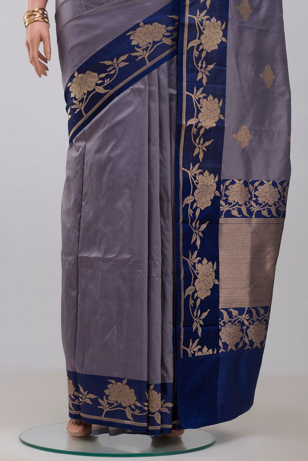 Pleats and pallu of Blue Grey Banarasi Katan Silk Saree with Zari Butta on the body and Fancy Border. 