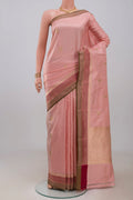 Rose Gold Banarasi Katan Silk Saree with Zari Butta on the body and Fancy Border.  displayed on a mannequin