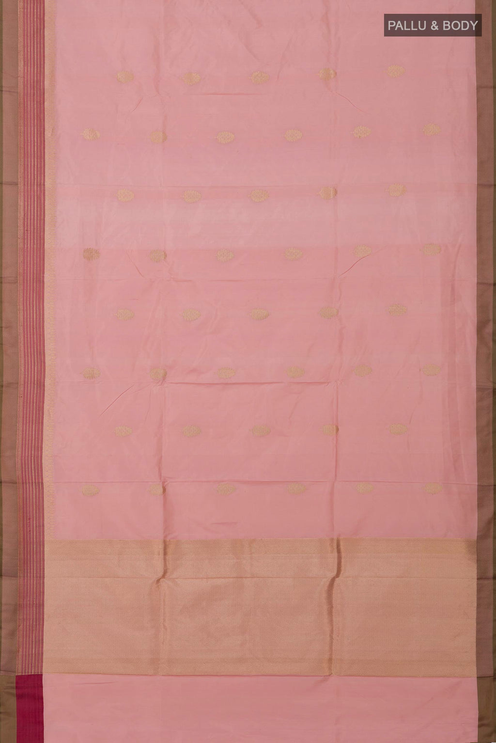 Flat view of Rose Gold Banarasi Katan Silk Saree with Zari Butta on the body and Fancy Border. 