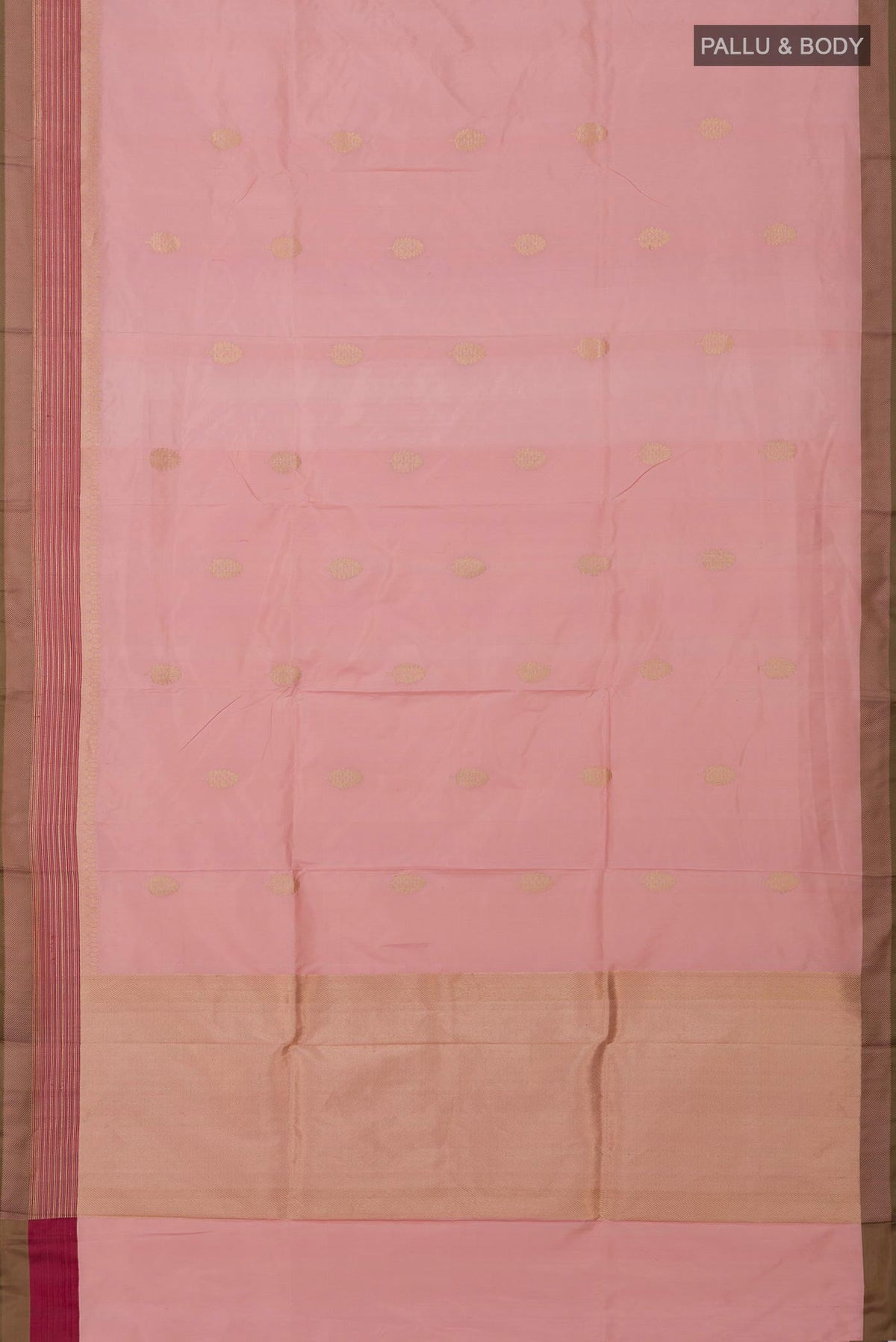 Flat view of Rose Gold Banarasi Katan Silk Saree with Zari Butta on the body and Fancy Border. 