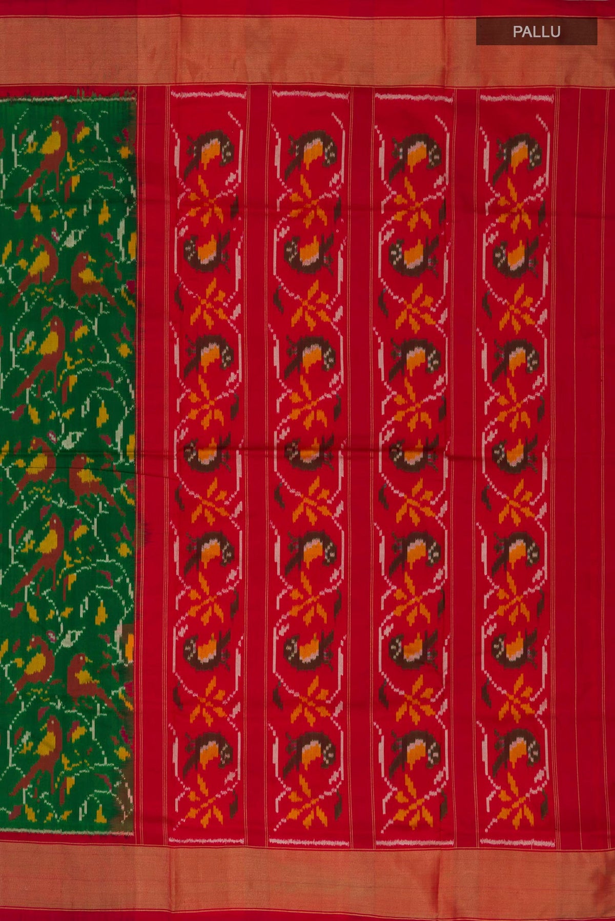 Close up image of the pallu of Green Pochampally Silk Saree with Ikat design on the body and Zari Border. 
