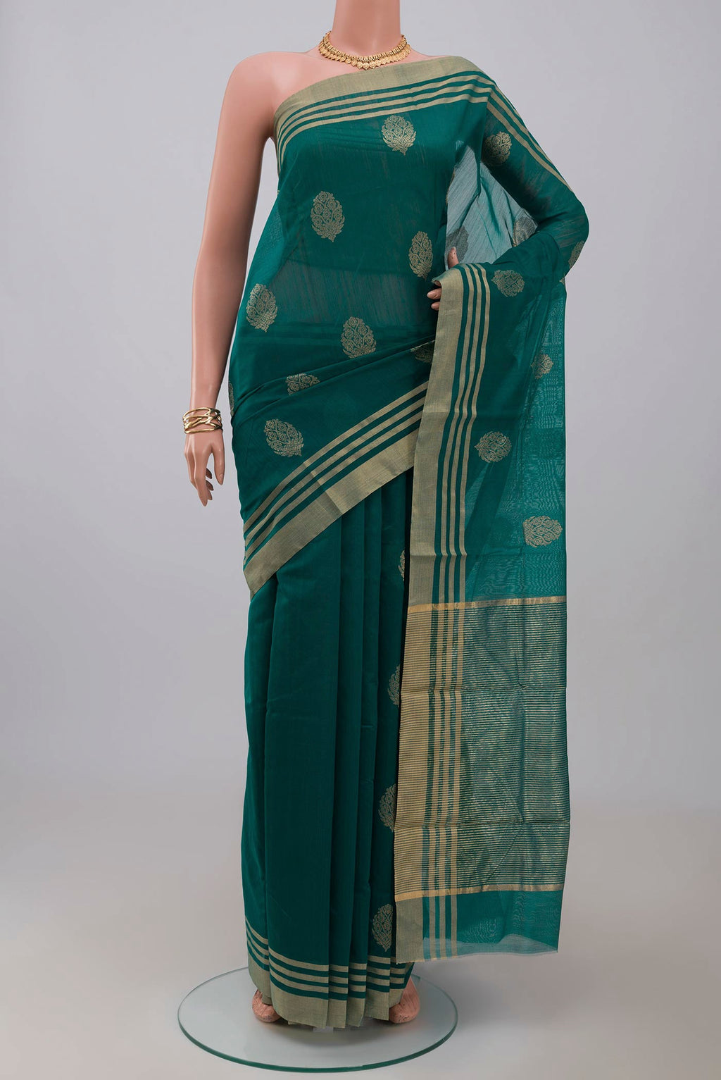 Blue Chanderi Silk Cotton Saree with Zari Butta on the body and Zari Border.  displayed on a mannequin