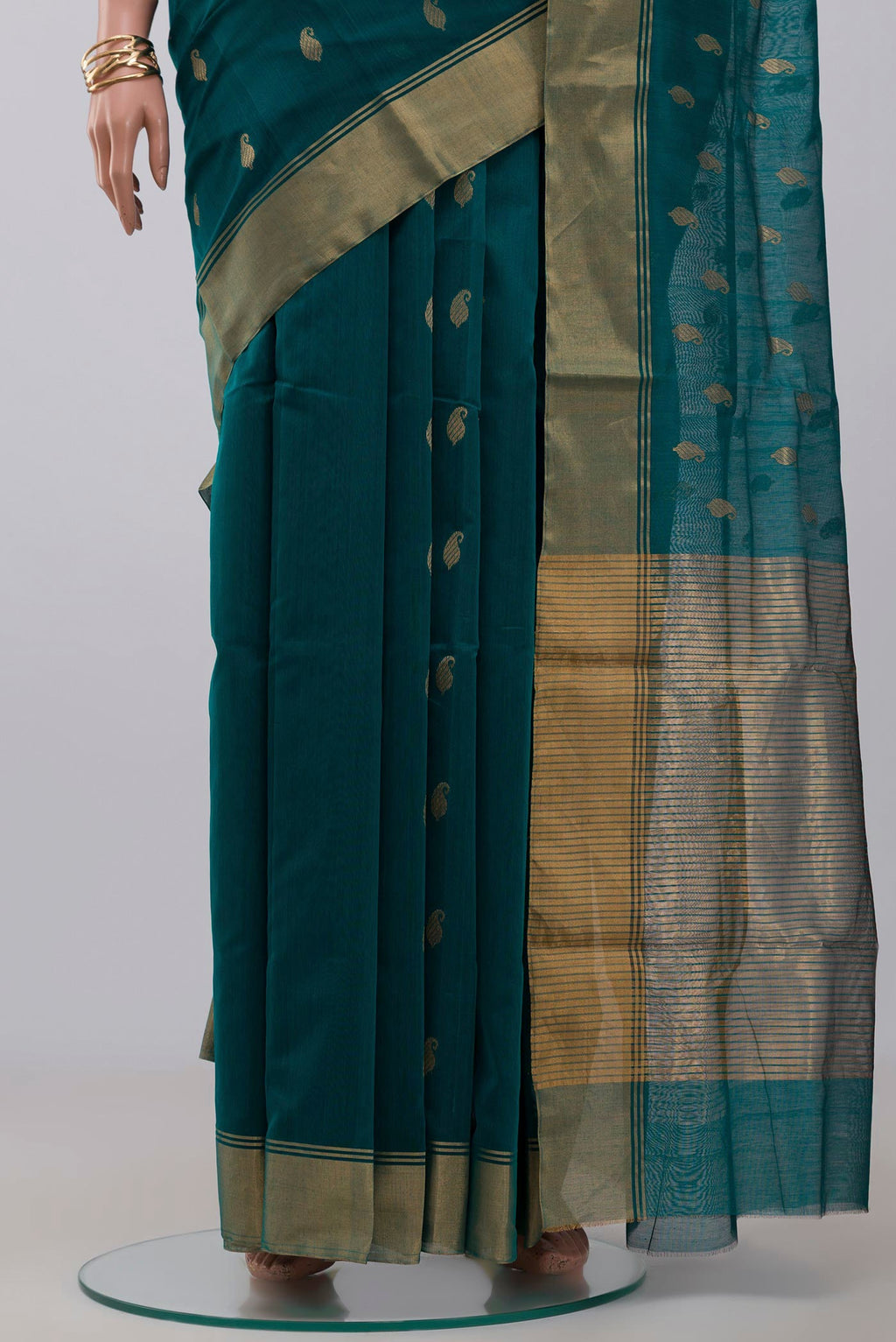 Pleats and pallu of Green Chanderi Silk Cotton Saree with Zari Butta on the body and Zari Border. 