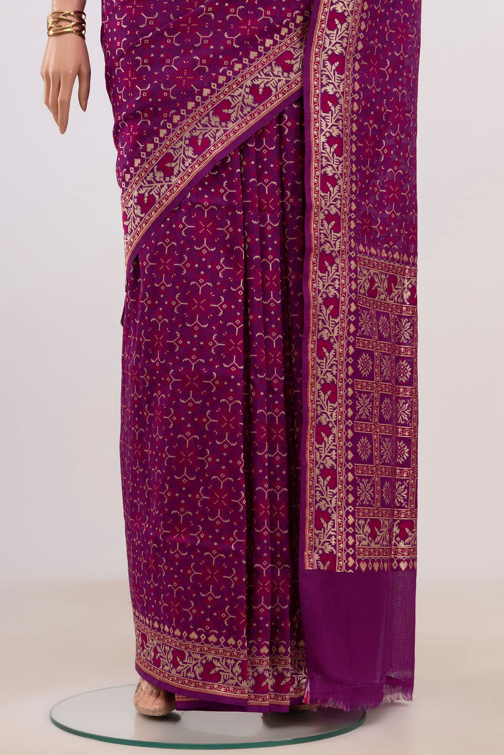 Pleats and pallu of Purple Banarasi Saree with Fancy on the body and Fancy Border. 