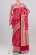Pink Banarasi Silk Saree with Zari And Thread Butta on the body and Zari Border.  displayed on a mannequin
