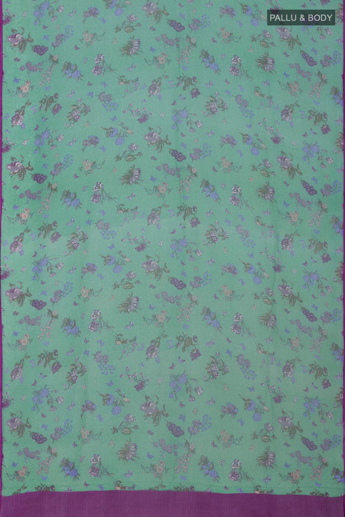 Flat view of Green Chiffon Saree with Printed design on the body and Without Border. 