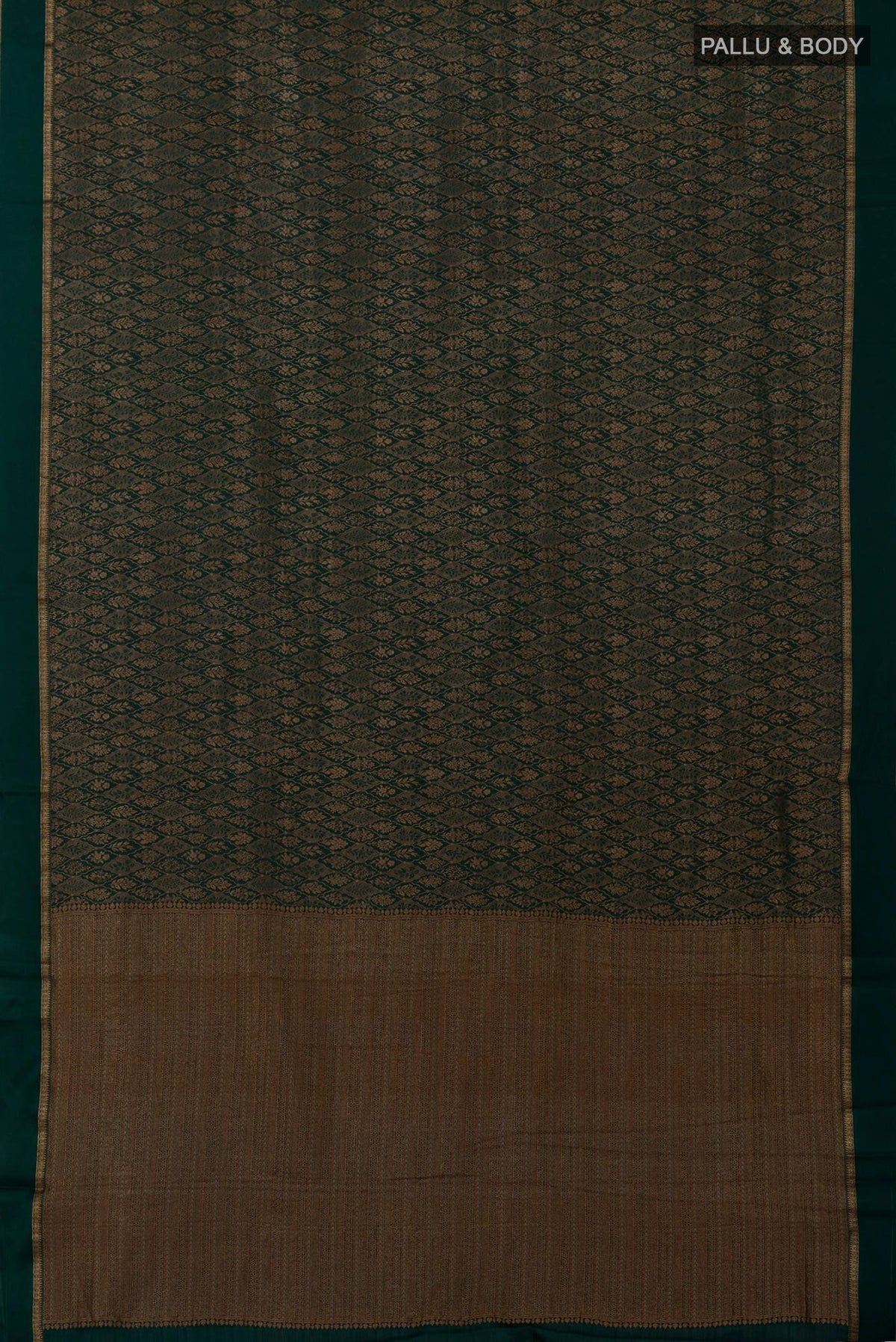 Flat view of Bottle Green Mysore Crepe Saree with Zari Brocade on the body and Thin Zari Line. 