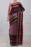 Lavender Soft Silk Saree with Fancy on the body and Fancy Border.  displayed on a mannequin