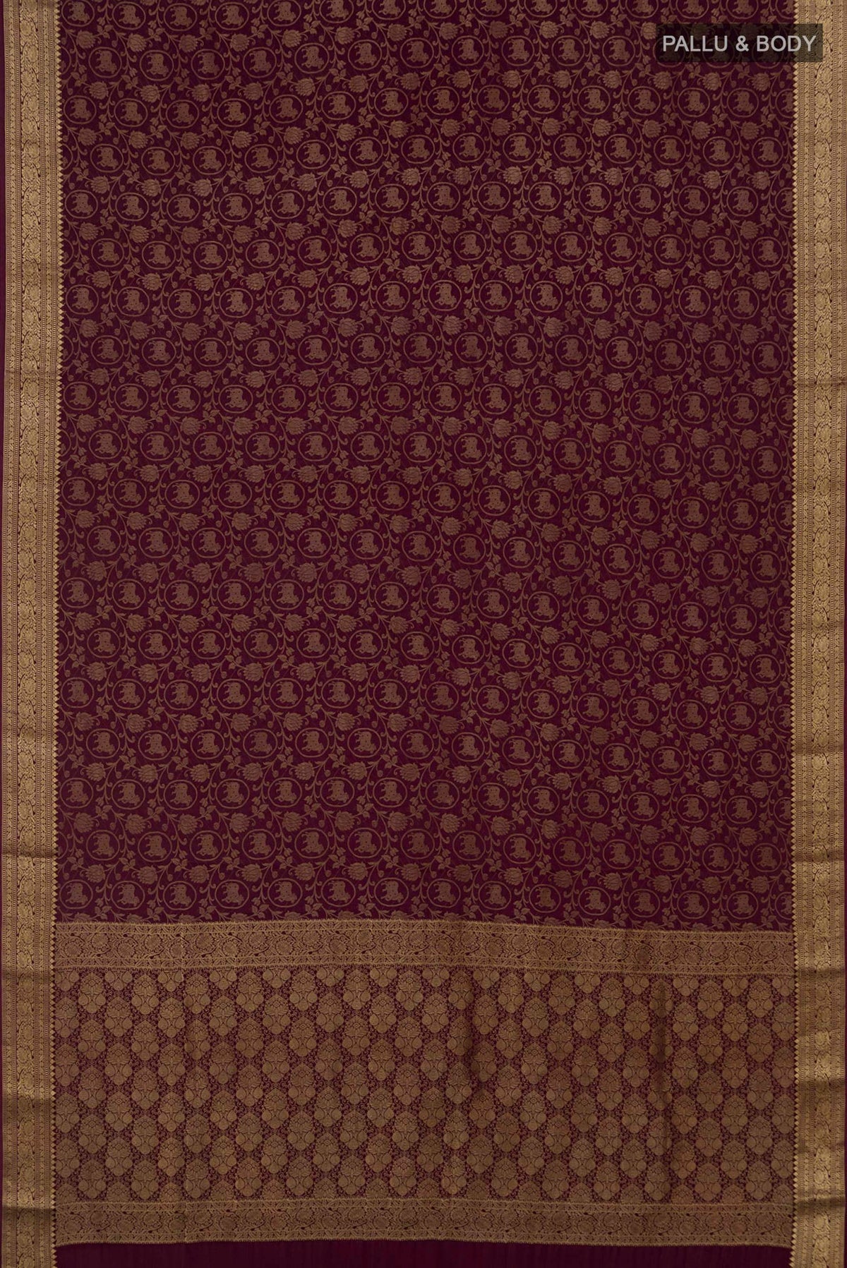 Flat view of Purple Mysore Crepe Saree with Zari Brocade on the body and Zari Border. 