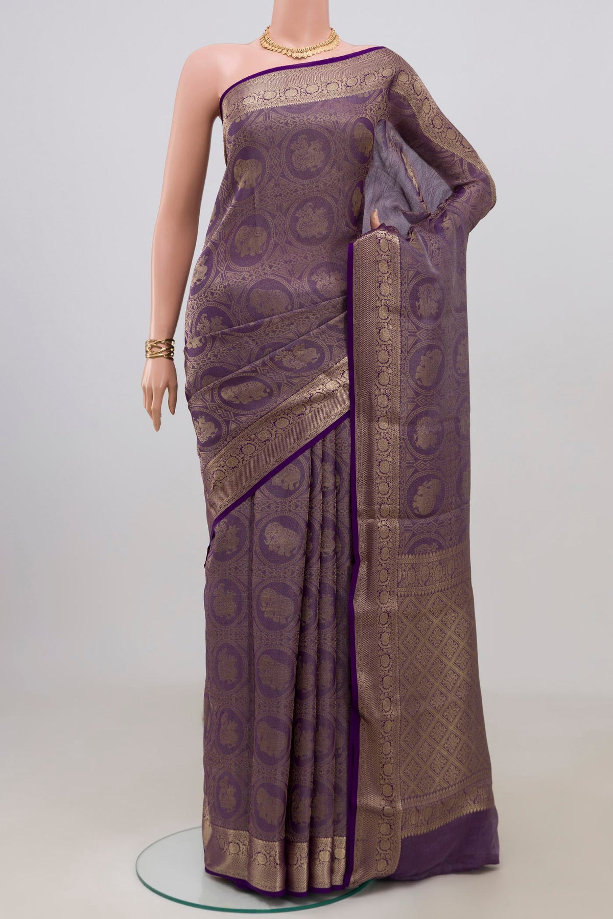Violet Mysore Crepe Saree with Zari Brocade on the body and Zari Border.  displayed on a mannequin