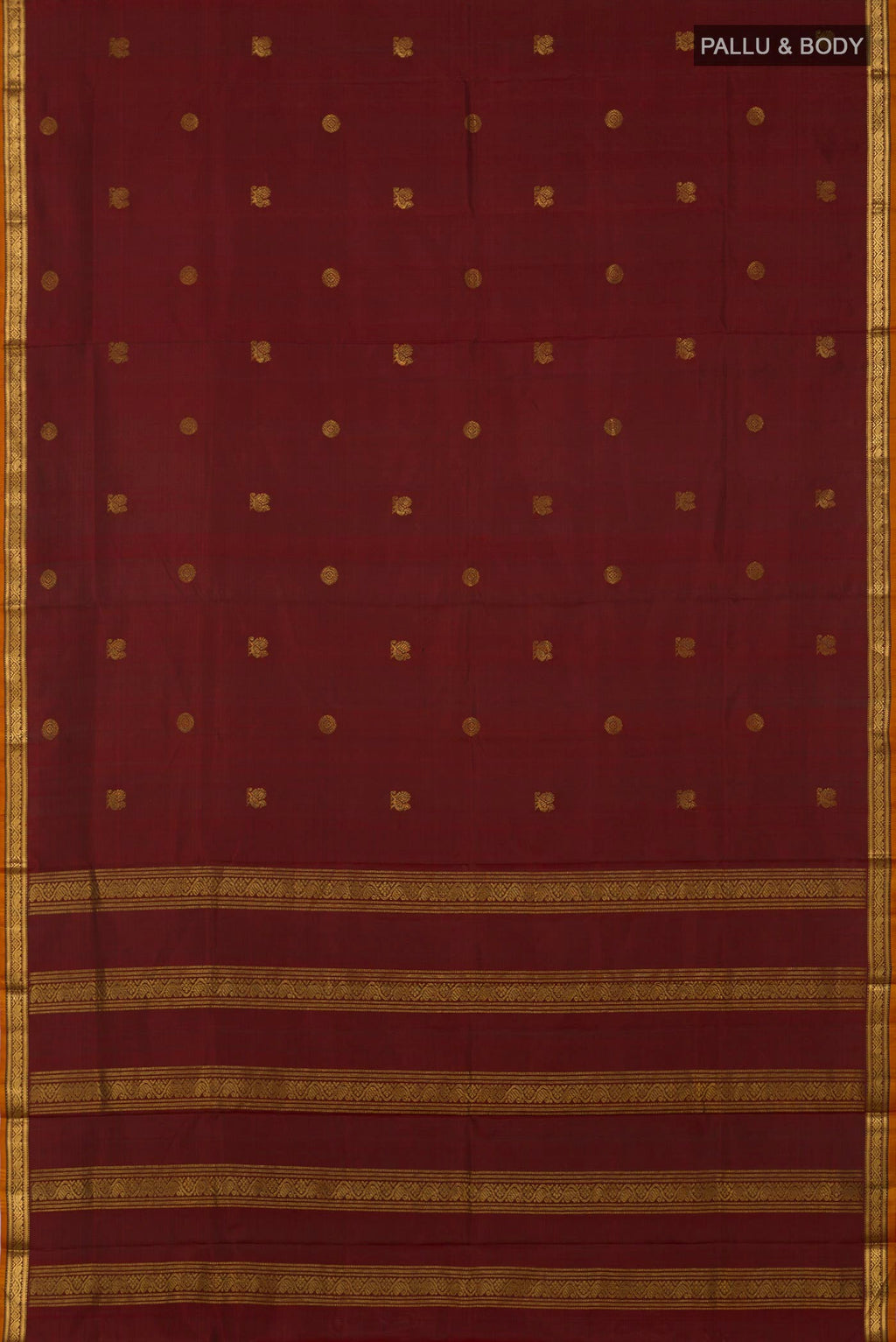 Flat view of Maroon Kanchipuram Silk Saree with Zari Butta on the body and Zari Border. 
