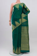 Green Kanchipuram Saree with Plain Body and Temple Border.  displayed on a mannequin