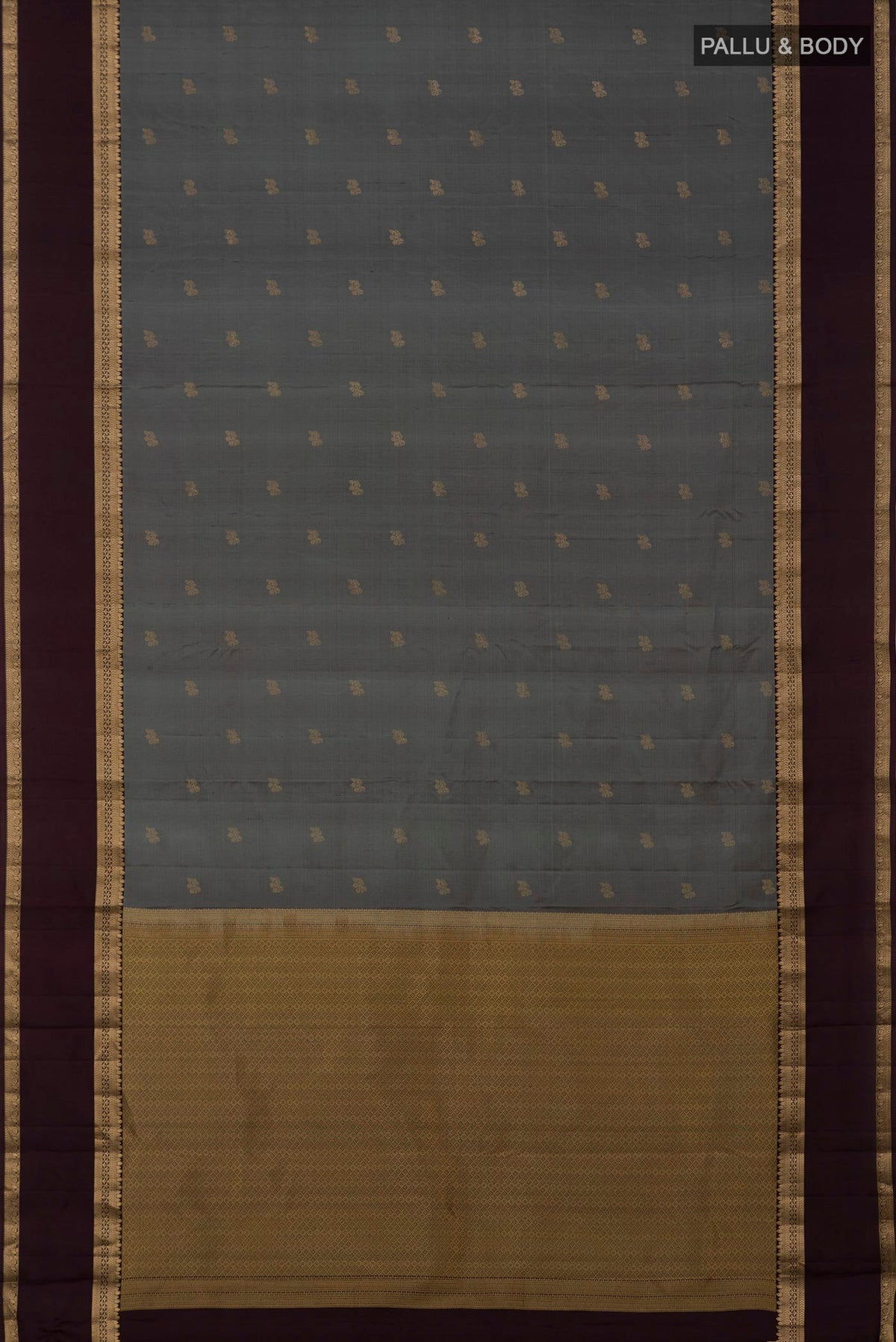 Flat view of Grey Kanchipuram Silk Saree with Zari Butta on the body and Zari Border. 