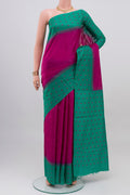 Magenta Tussar Silk Saree with Plain Body and Fancy Border.  displayed on a mannequin