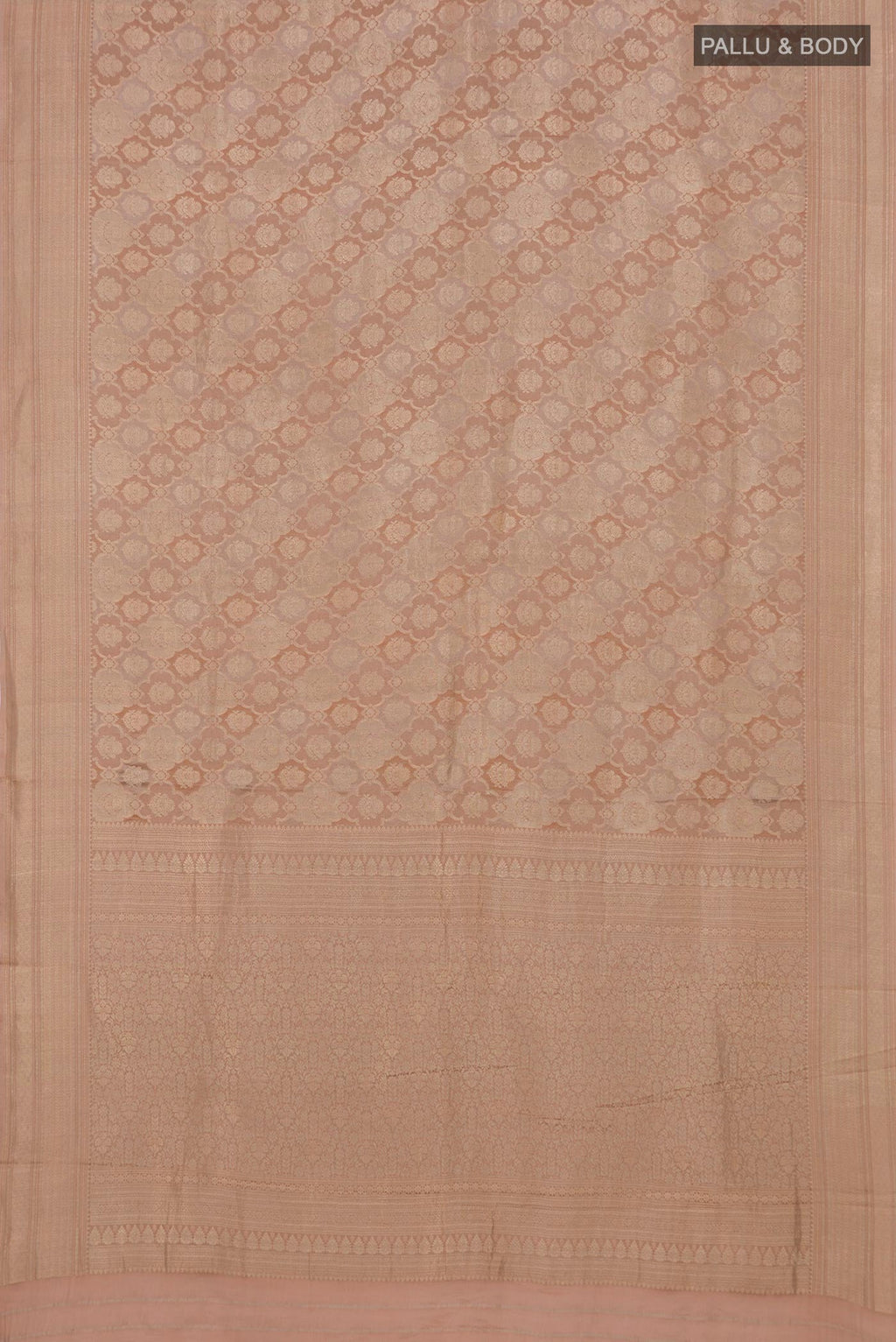 Flat view of Rose Gold Crepe Saree with Zari Brocade on the body and Zari Border. 