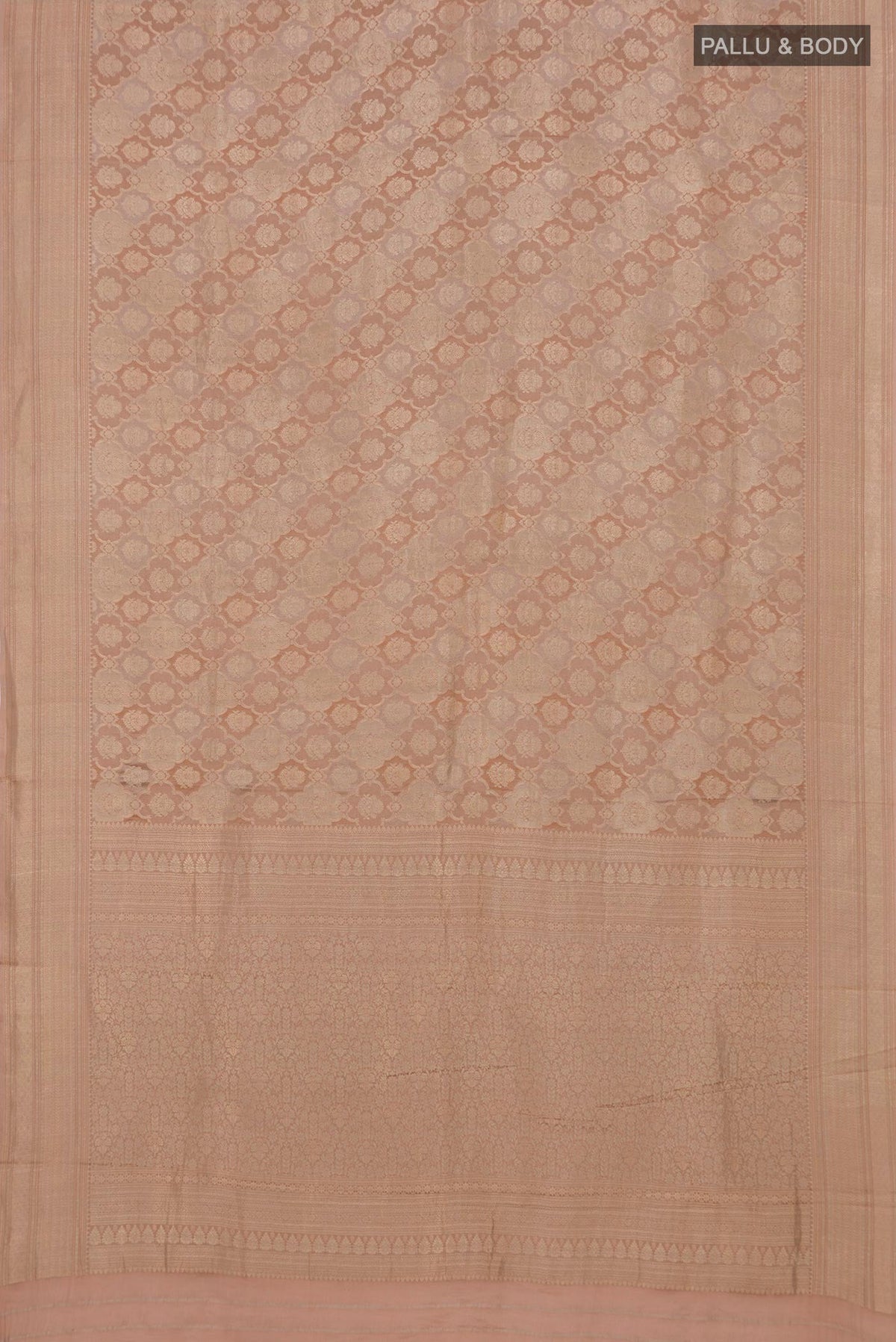 Flat view of Rose Gold Crepe Saree with Zari Brocade on the body and Zari Border. 