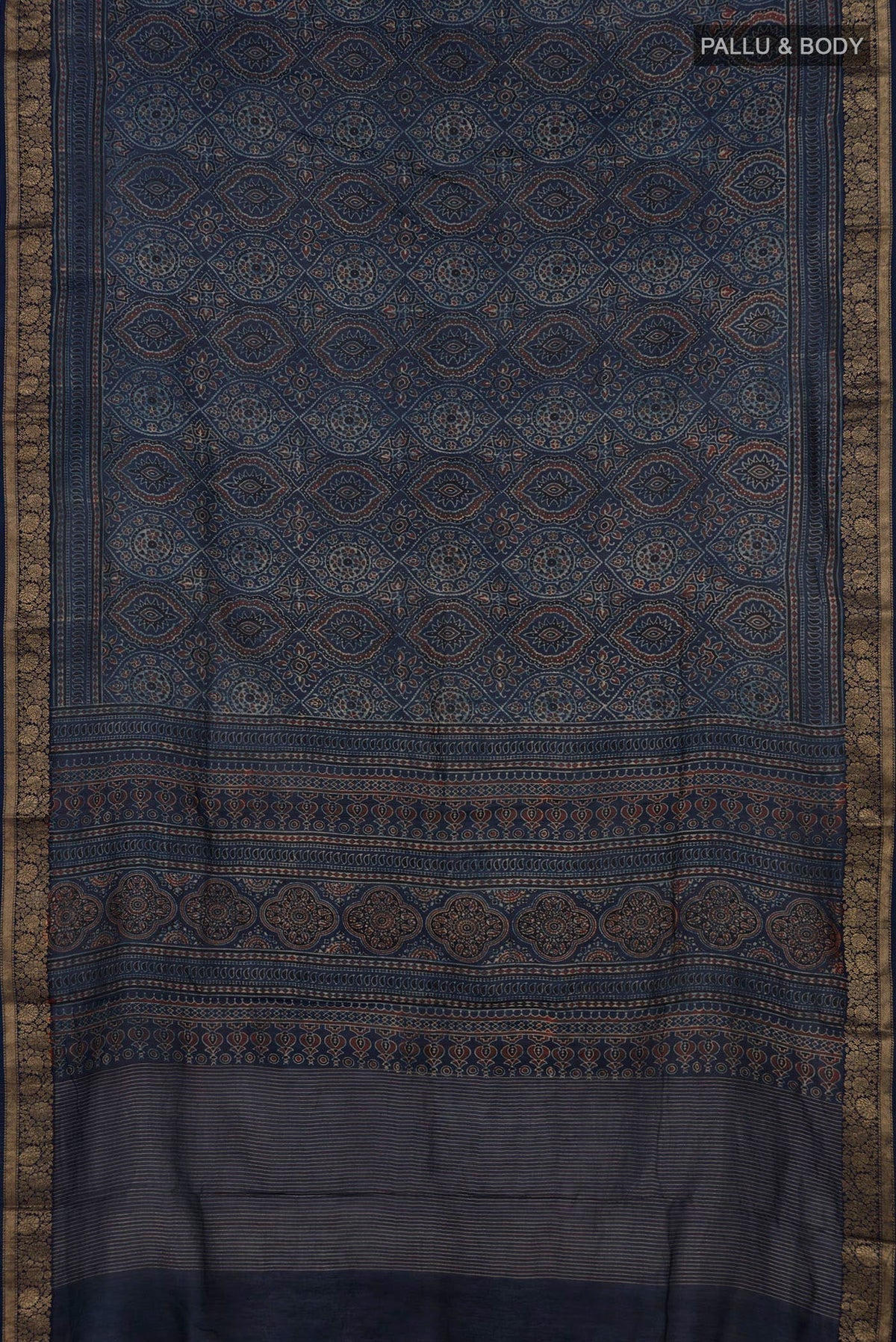 Flat view of Navy Blue Chanderi Silk Cotton Saree with Ajrakh Print on the body and Zari Border. 