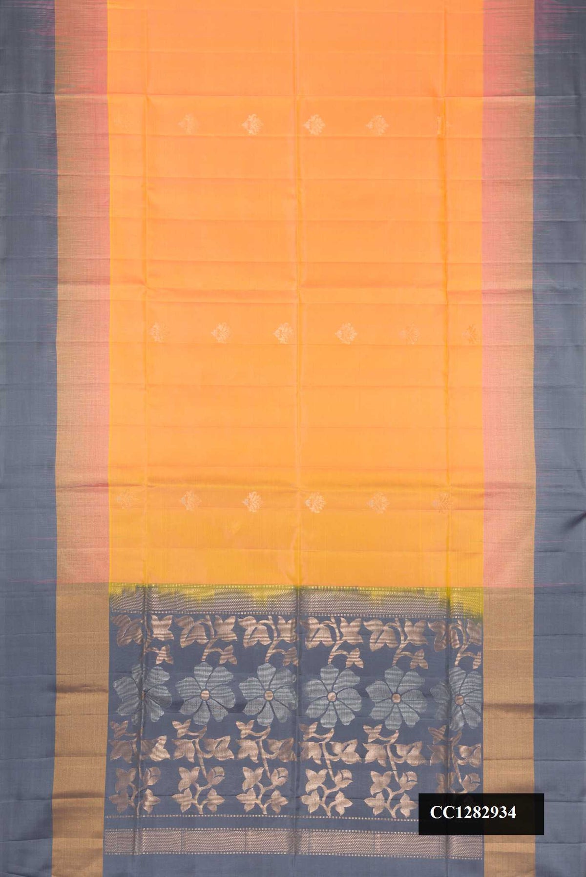 Mustard Dual Tone Soft Silk Saree with Zari Butta on the body and Zari Border.  displayed on a mannequin