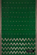 Bottle Green Dual Tone Soft Silk Saree with Zari Butta on the body and Zari Border.  displayed on a mannequin