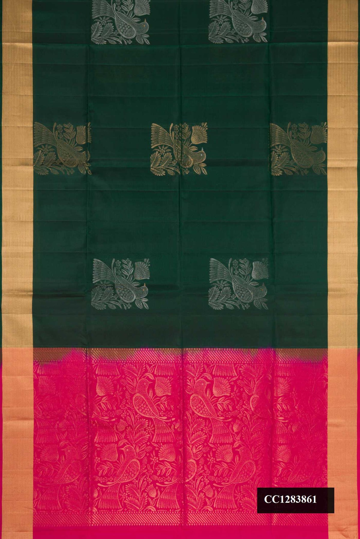 Bottle Green Dual Tone Soft Silk Saree with Zari Butta on the body and Zari Border.  displayed on a mannequin