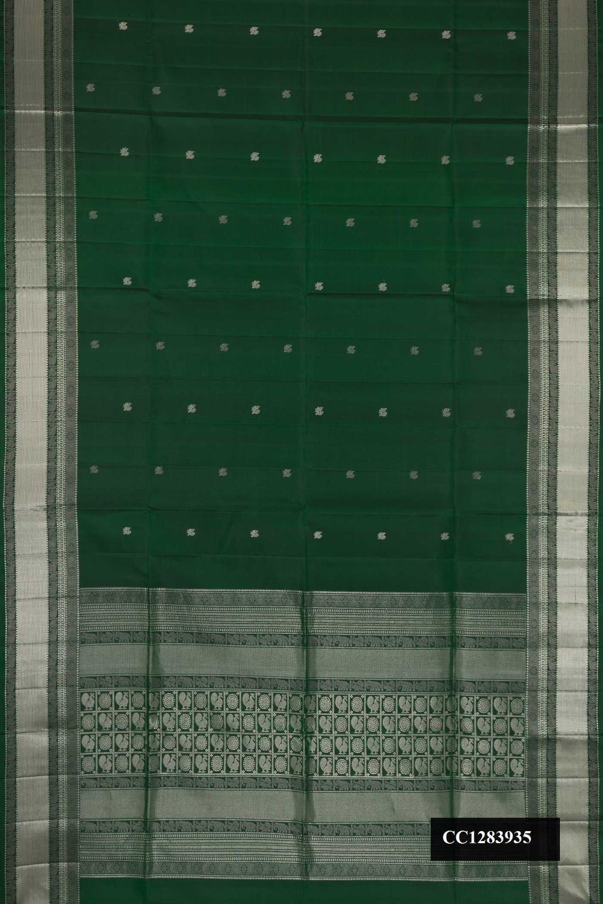 Bottle Green Dual Tone Soft Silk Saree with Zari Butta on the body and Zari Border.  displayed on a mannequin