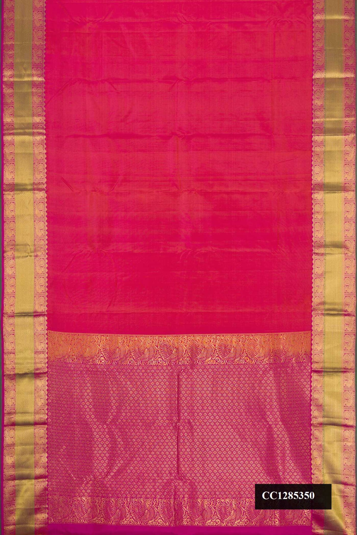 Orange Dual Tone Kanchipuram Silk Saree with Plain Body and Zari Border.  displayed on a mannequin