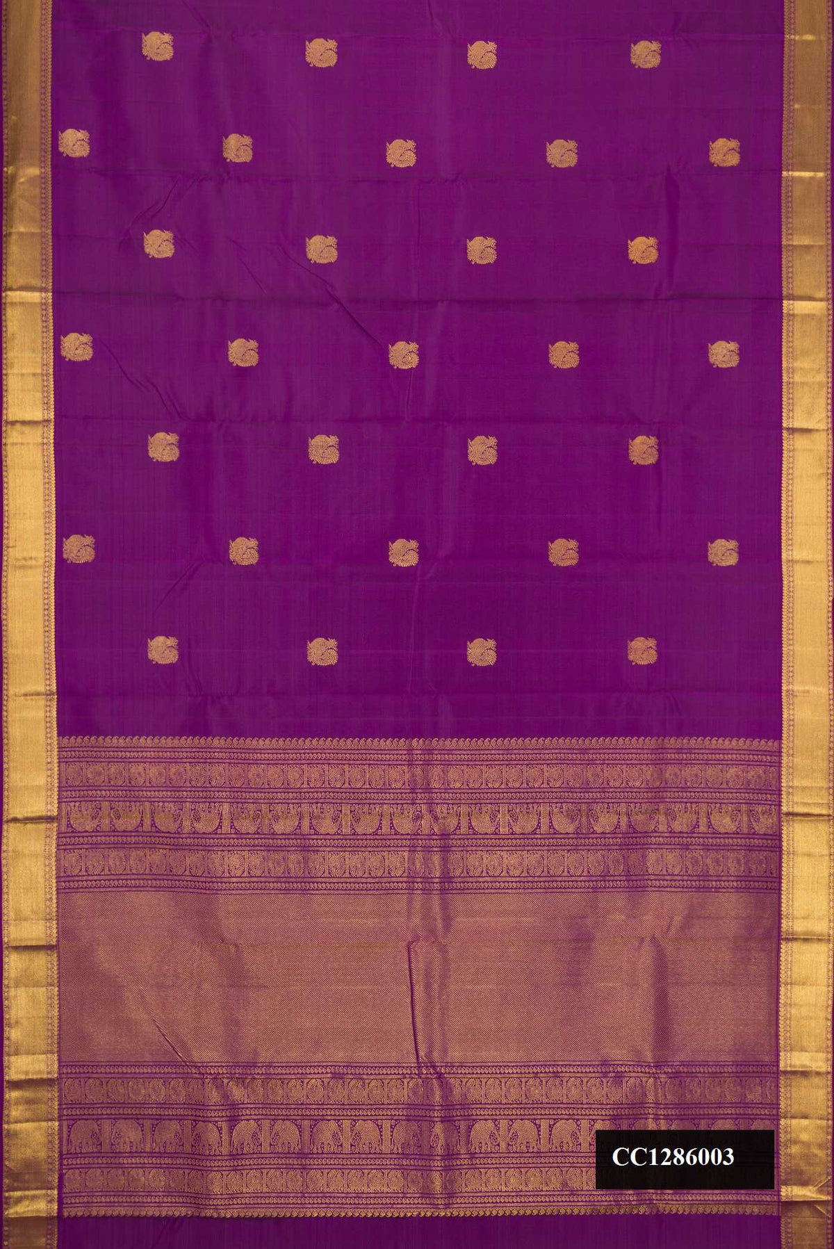 Violet Dual Tone Kanchipuram Silk Saree with Zari Butta on the body and Zari Border.  displayed on a mannequin