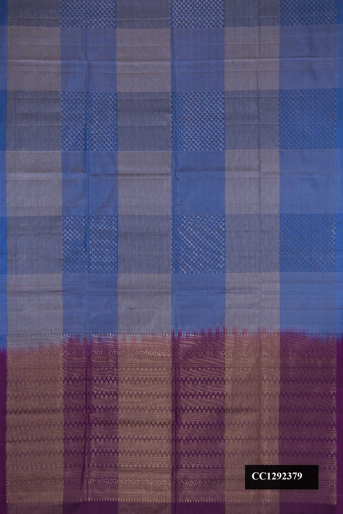 Royal Blue Dual Tone Soft Silk Saree with Checked design on the body and Without Border.  displayed on a mannequin