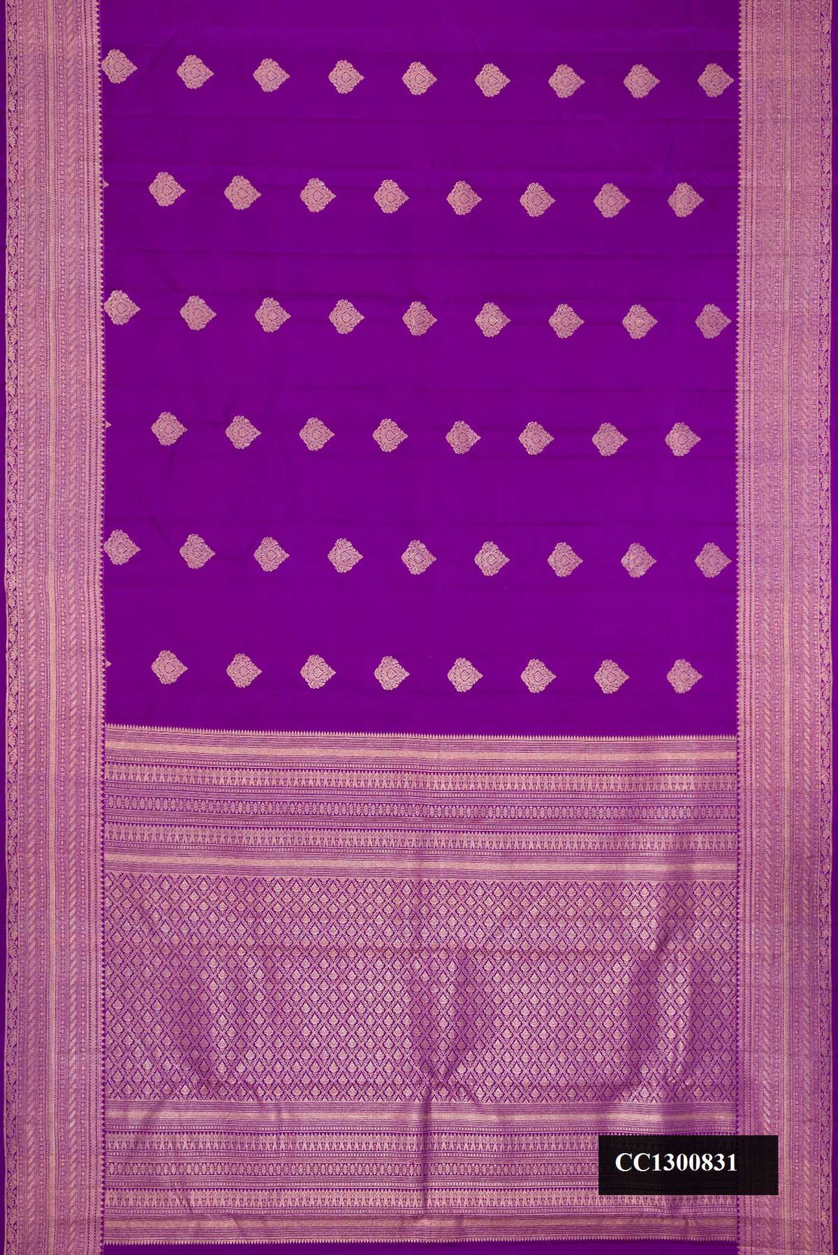 Violet Dual Tone Kanchipuram Silk Saree with Zari Butta on the body and Zari Border.  displayed on a mannequin