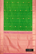 Green Dual Tone Kanchipuram Silk Saree with Zari Butta on the body and Zari Border.  displayed on a mannequin