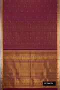 Burgundy Dual Tone Kanchipuram Silk Saree with Checked design on the body and Zari Border.  displayed on a mannequin
