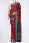 Maroon Dual Tone Double Ikat Saree with Ikat Print on the body and Thread Border.  displayed on a mannequin