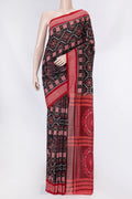 Black Dual Tone Double Ikat Saree with Ikat Print on the body and Thread Border displayed on a mannequin