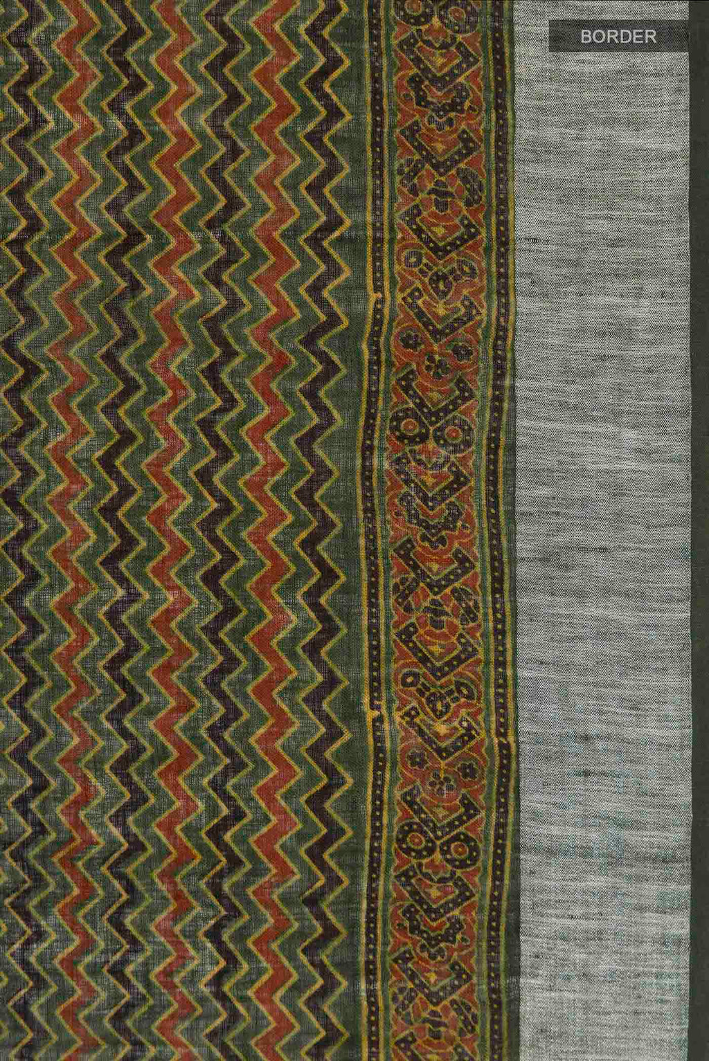 Border image of Green Linen Saree with Printed design on the body and Zari Border