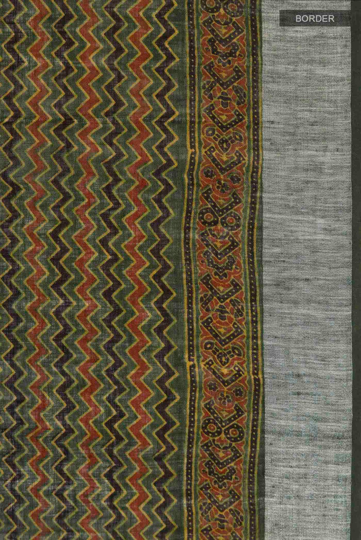 Border image of Green Linen Saree with Printed design on the body and Zari Border