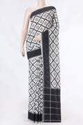 Off White Dual Tone Double Ikat Saree with Ikat Print on the body and Plain Border displayed on a mannequin