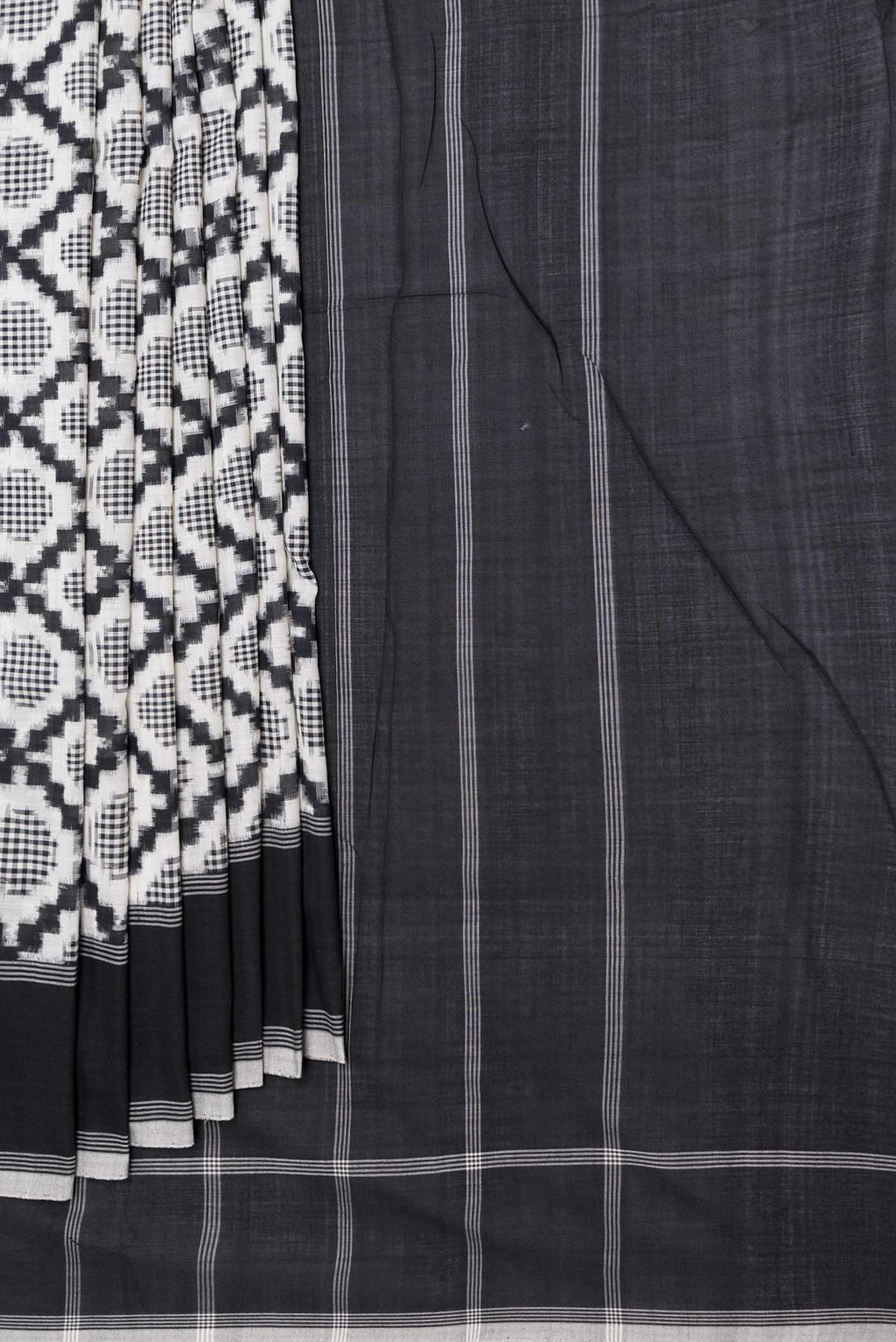 Pleats and pallu of Off White Dual Tone Double Ikat Saree with Ikat Print on the body and Plain Border
