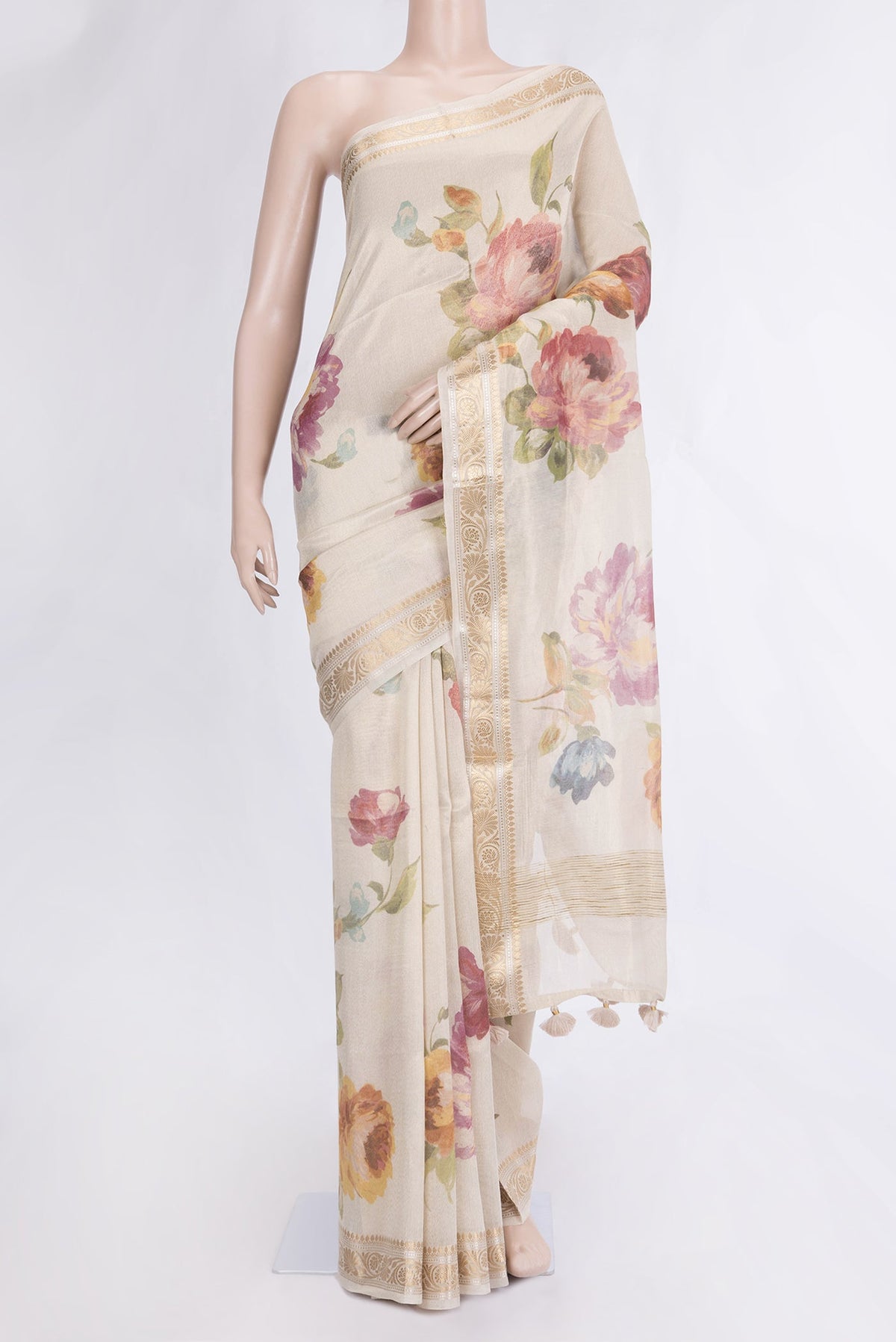 Beige Dual Tone Organza Silk Saree with Printed design on the body and Zari Border.  displayed on a mannequin
