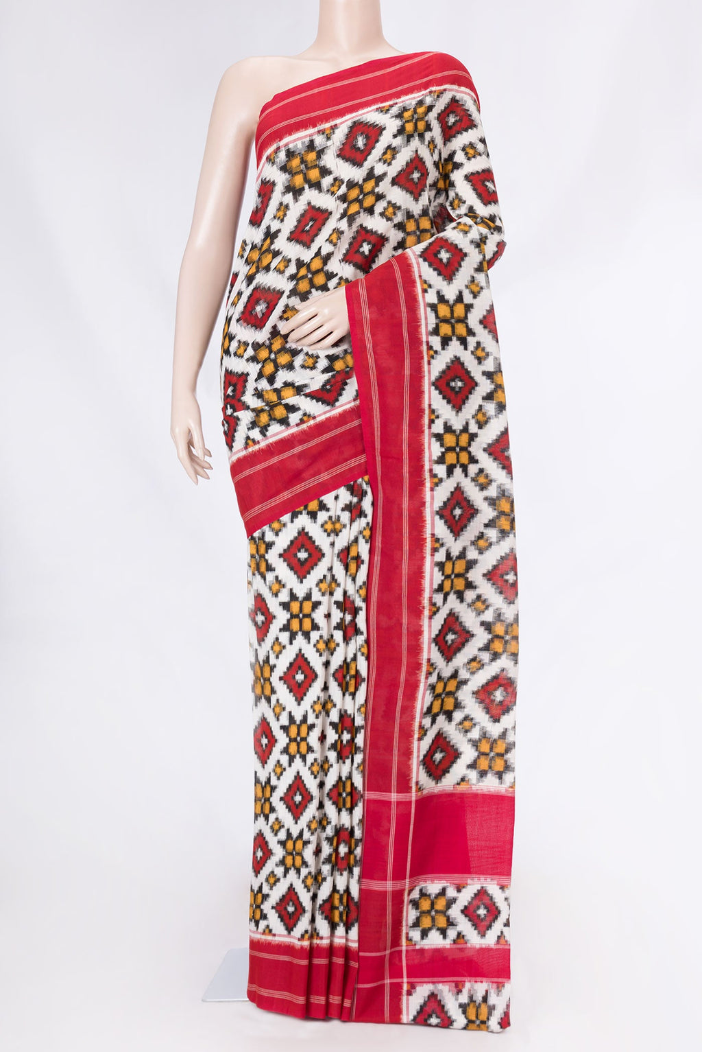 Off White Dual Tone Double Ikat Saree with Ikat Print on the body and Plain Border displayed on a mannequin