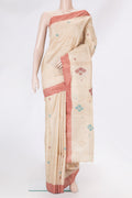 Beige Tussar Silk Saree with Thread Butta on the body and Plain Border.  displayed on a mannequin