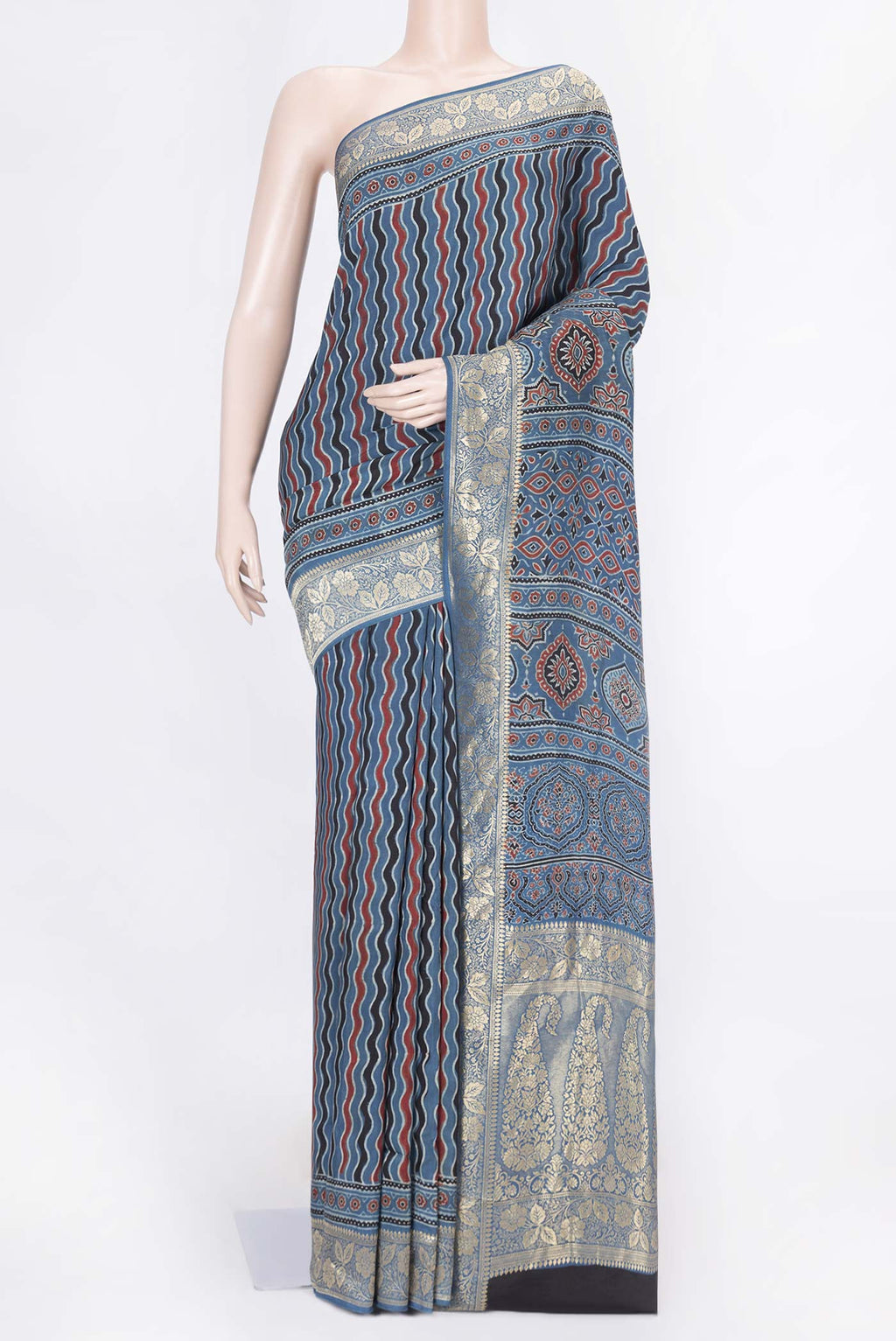Blue Dual Tone Tussar Silk Saree with Printed design on the body and Zari Border displayed on a mannequin