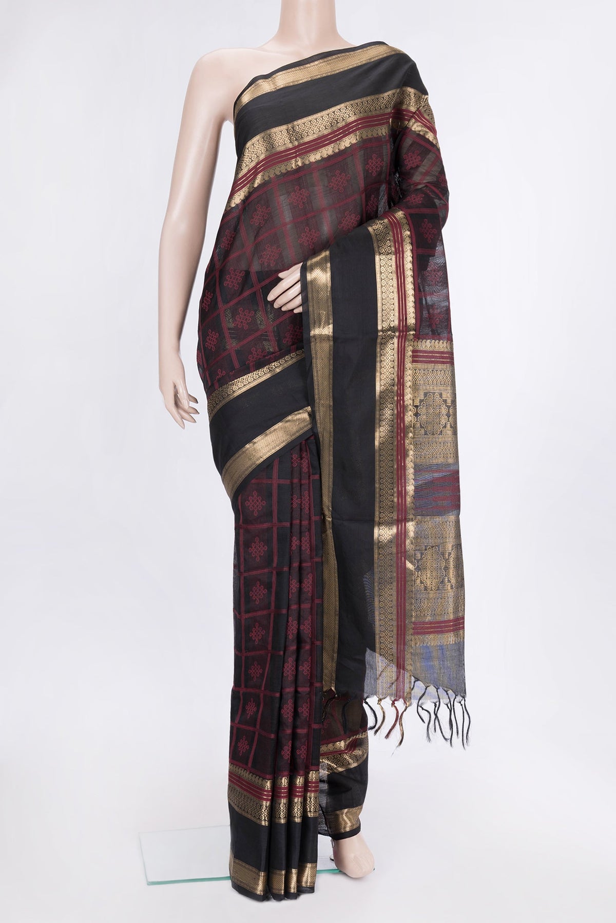 Black Dual Tone Silk Cotton Saree with Thread Butta on the body and Zari Border.  displayed on a mannequin