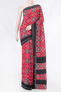 Red Dual Tone Double Ikat Saree with Ikat Print on the body and Plain Border displayed on a mannequin