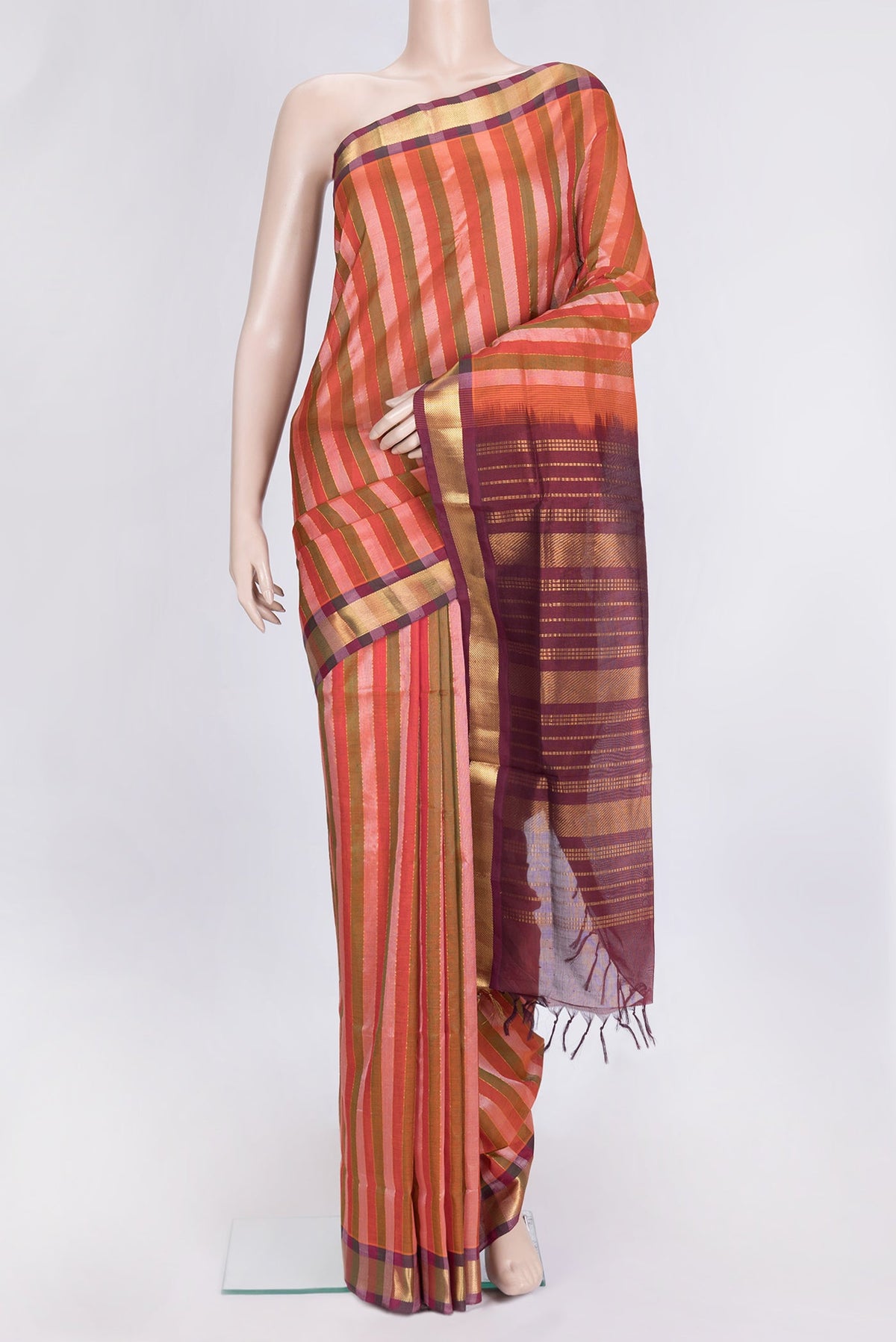 Red and Green Color Silk Cotton Saree with Stripes on the body and Zari Border.  displayed on a mannequin